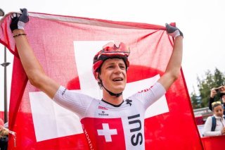 La joie de Finn Treudler, nouveau champion du monde M23 KEYSTONE/MAXIME SCHMID